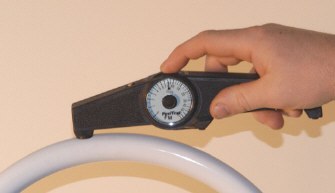 PosiTest FM measuring cured powder coating thickness on a steel part