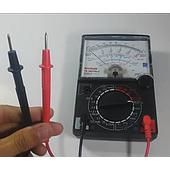 Can an analog multimeter still measure capacitors?