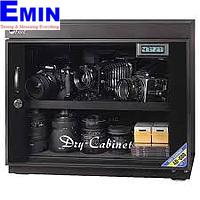 Technician servicing a dry cabinet used for controlled low-humidity storage