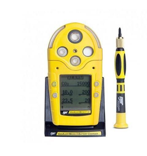 Technician inspecting gas detection and air measurement instruments