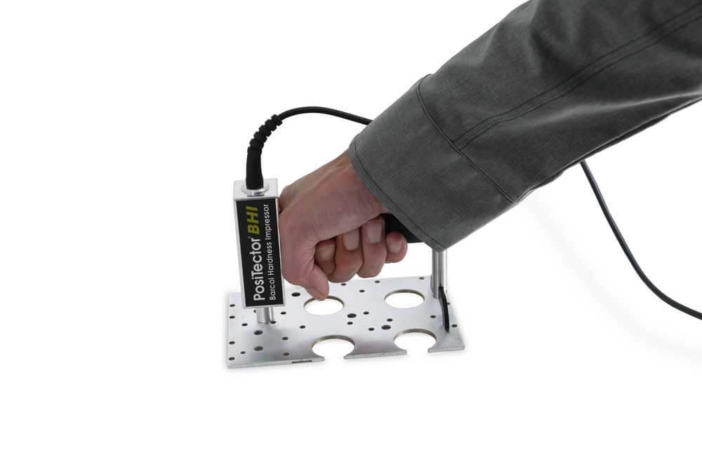 PosiTector BHI Barcol Hardness Impressor measuring aluminum