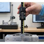 Should you prioritize water resistance or resolution when choosing a depth gauge?