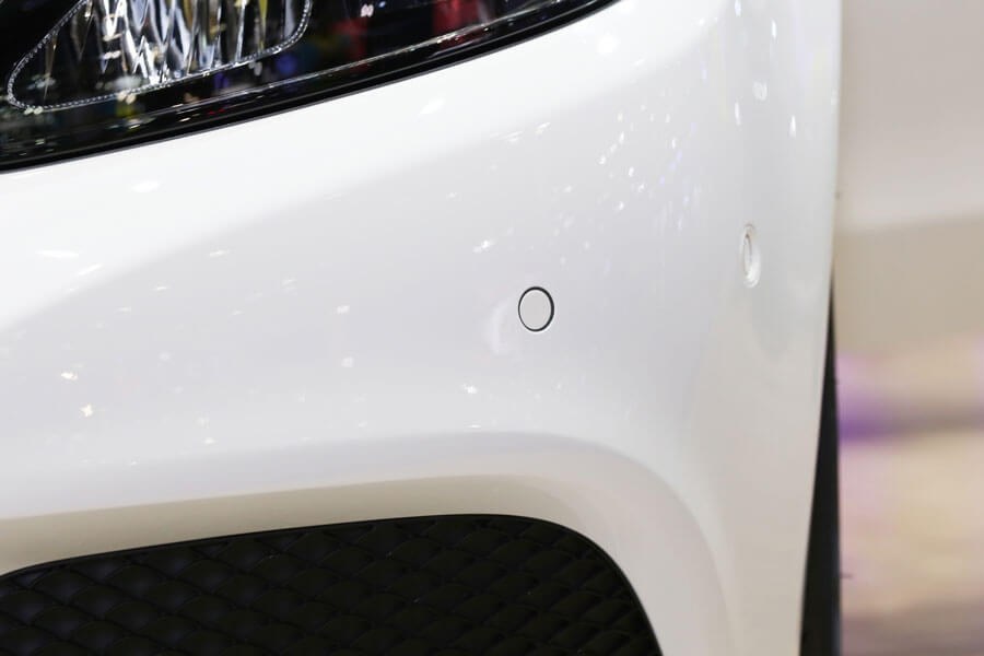Ultrasonic paint thickness measurement on a plastic automotive bumper