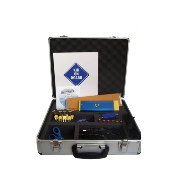 Technician handling a temperature recording instrument for inspection and repair