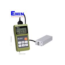 Technician handling a moisture measuring instrument during calibration service