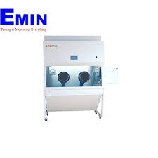 Technician performing calibration work on a laboratory biosafety cabinet